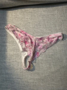 First row 1 red lacey christmas thong with bows 2 red lace thong with part 3