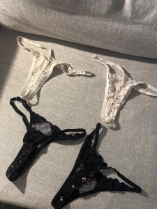 From the third row 1 white thong with pink flowers 2 white thong with