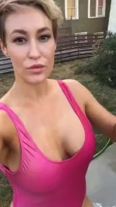 Standing in the sprinkler in my front yard