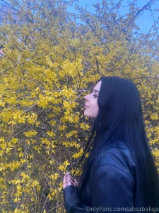 Girl is like a flower with the onset of warmth blooms so let s give