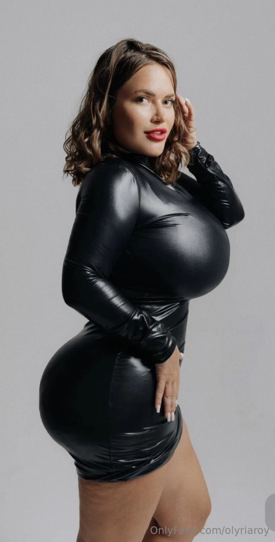 Look at me can you feel the heat rising this shiny black outfit doesn 