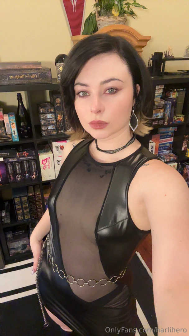 What s more distracting the sheer panel on this dress or all the books 