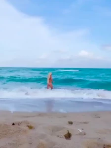 Do you prefer this white bikini or the black bikini