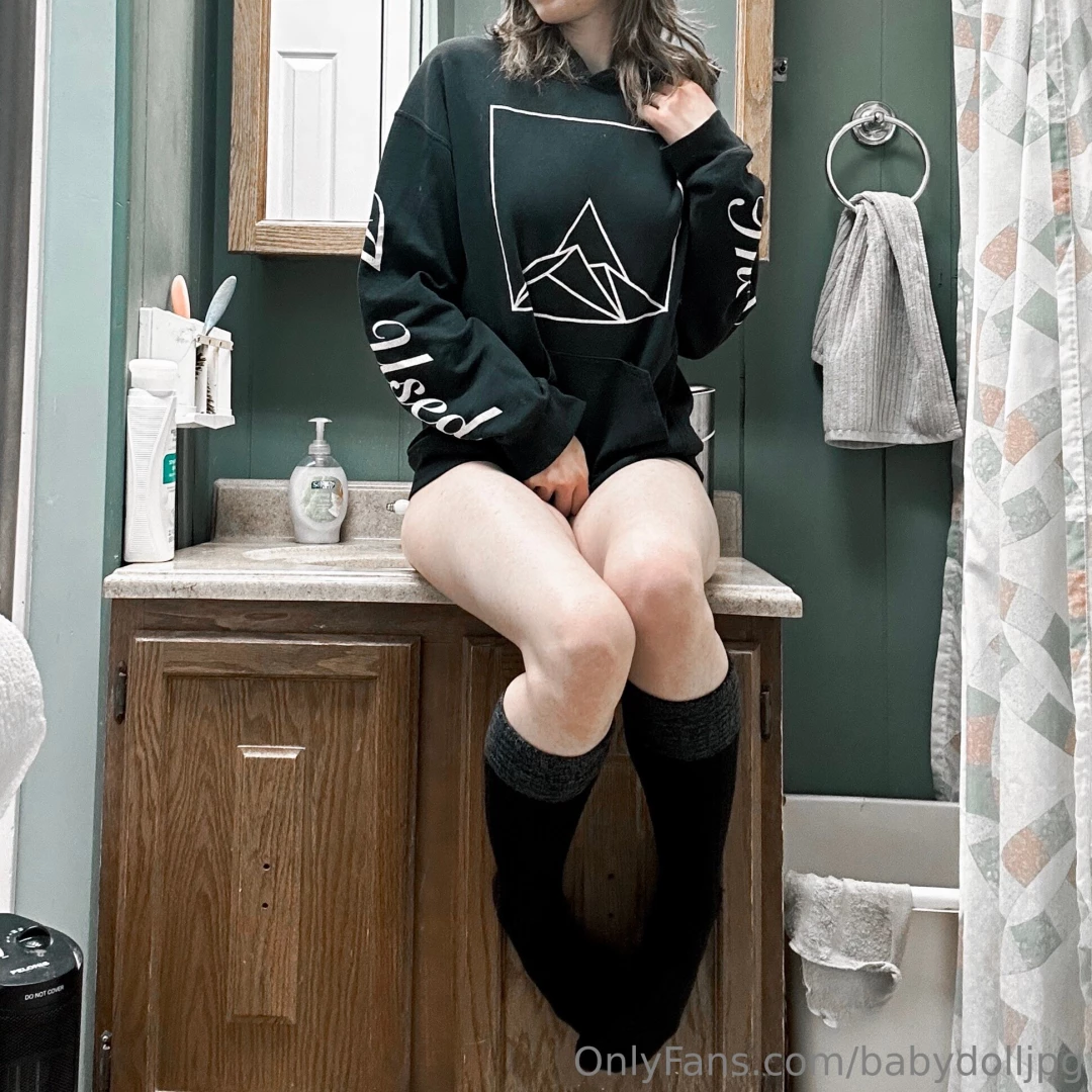 Thigh highs and a hoodie to keep warm in this cold weather 