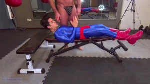 Shiny spandex superman after falling into the villain s trap and being