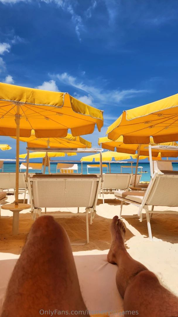 Sun sand and cocktails working on those tan lines 