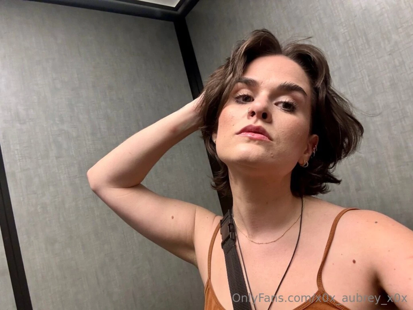 An uncomfortable elevator selfie this one s on me fellas 