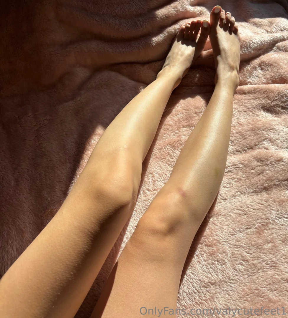 The sun kisses my white nails 