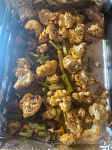 Preparing my lunch which turned out yummy cauliflower spicy with