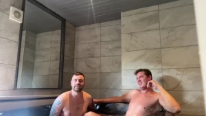 Getting my massive dick serviced by two jock studs in the hot tub