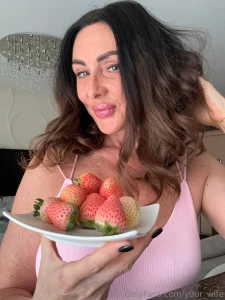 Enjoying strawberries makes my life brighter juicy sweet with a slight