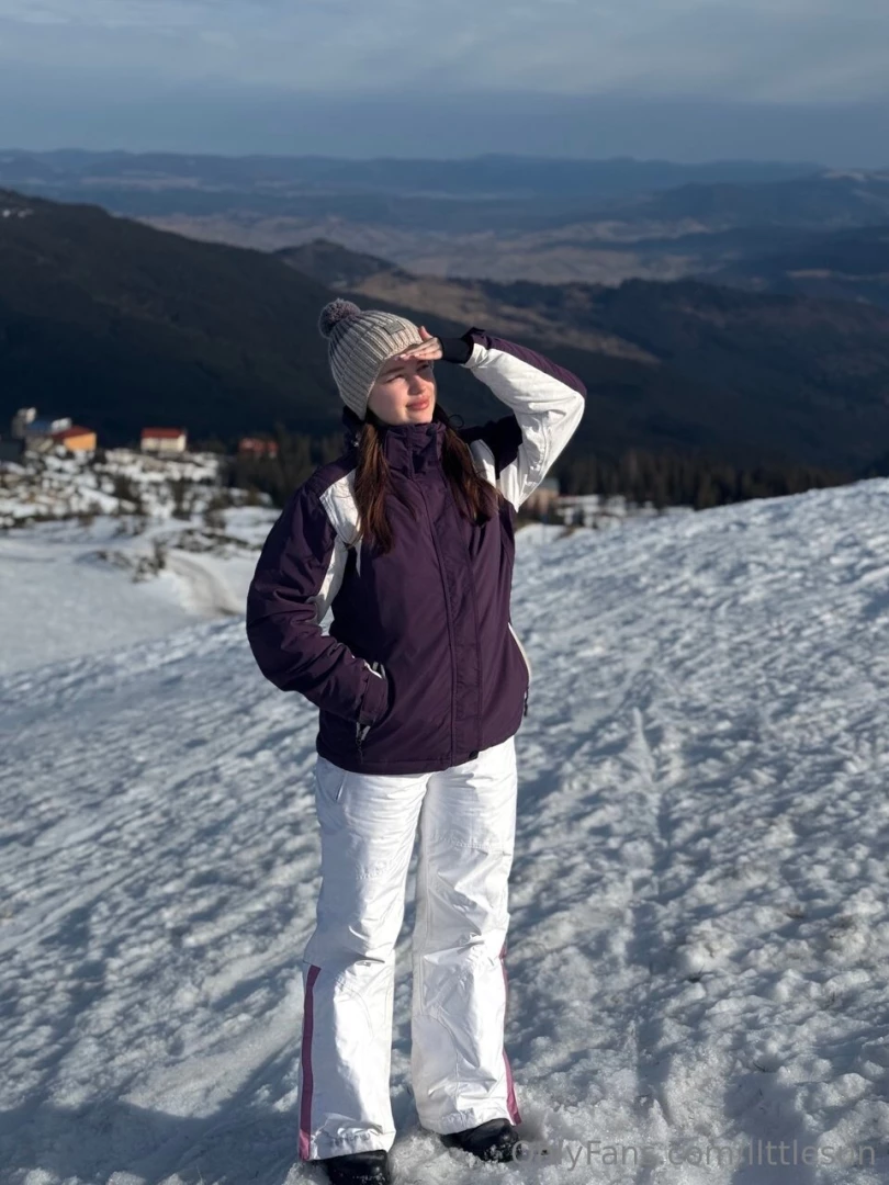 I m standing on top of a mountain surrounded by snow-covered trees and part 1 
