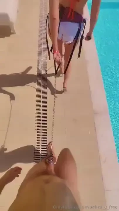 Walking slave by the pool 