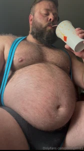 Eating a burrito in my singlet and rubbing my big growing belly makes