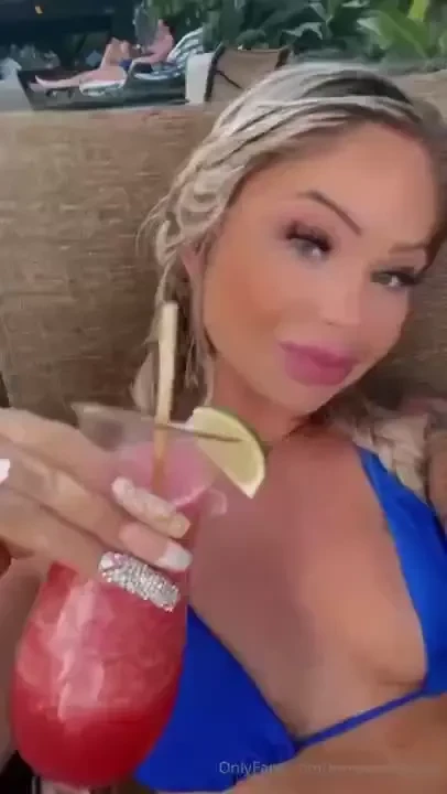 Enjoying myself poolside this evening with a drink in my hand 