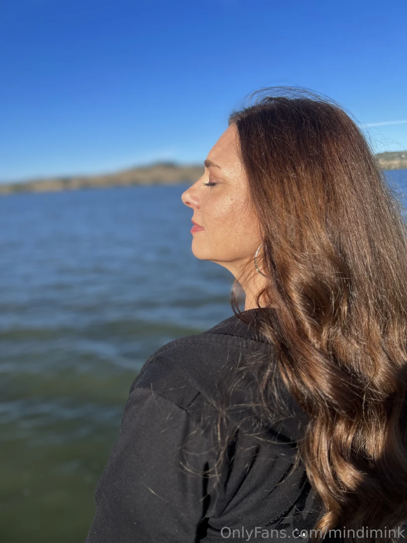 Eyes closed feeling the breeze and letting the moment take over there 