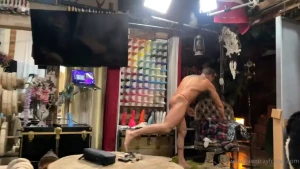 Getting oiled up while mentally preparing for a sweaty muscle pumping