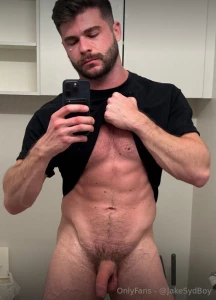 Naked in the bathroom standing in front of the mirror only my shirt on