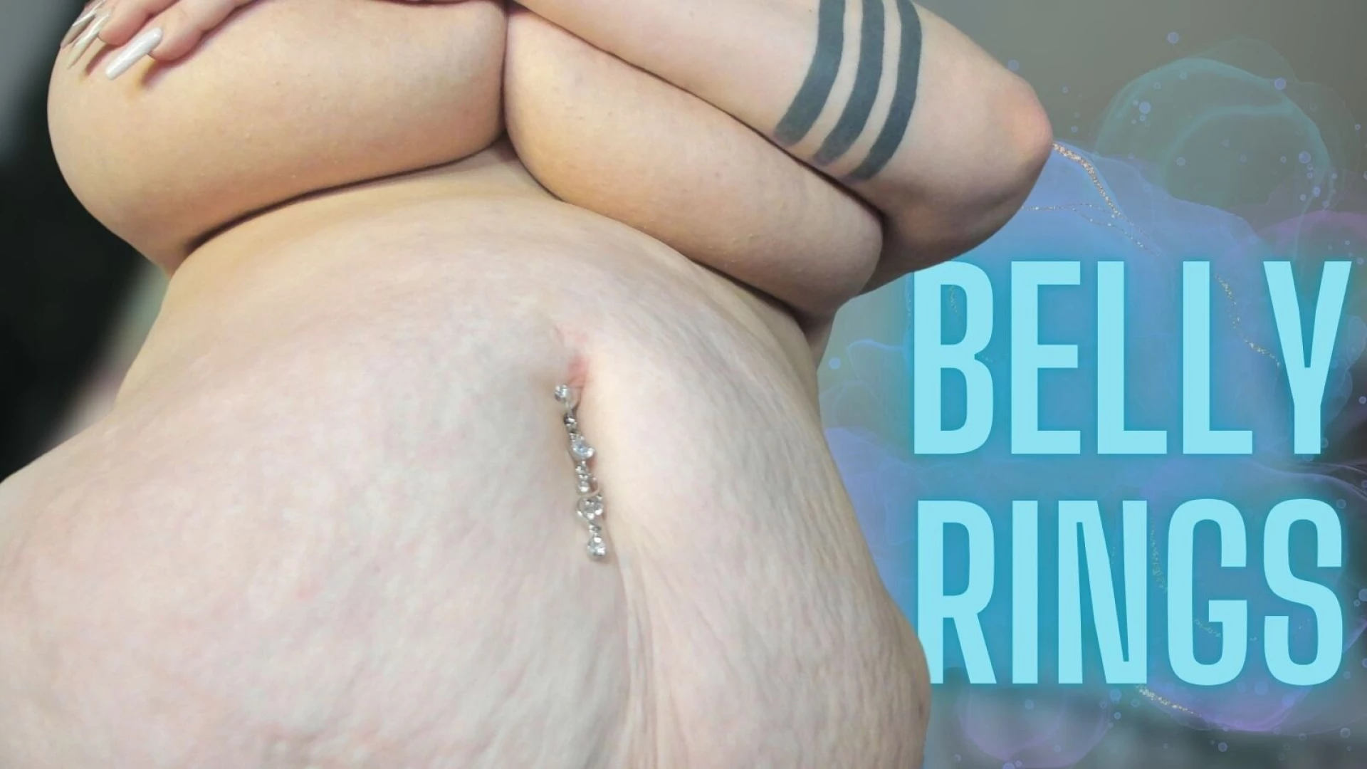 In this custom video i am trying on fake belly rings i try each of 