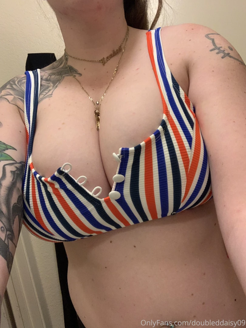 I m completely busing out of my bathing suit 
