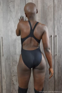 Tight fitting black yingfa swimsuit with a fresh bald shaved head part 3
