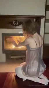 I m warming myself by the fireplace but i have something even hotter