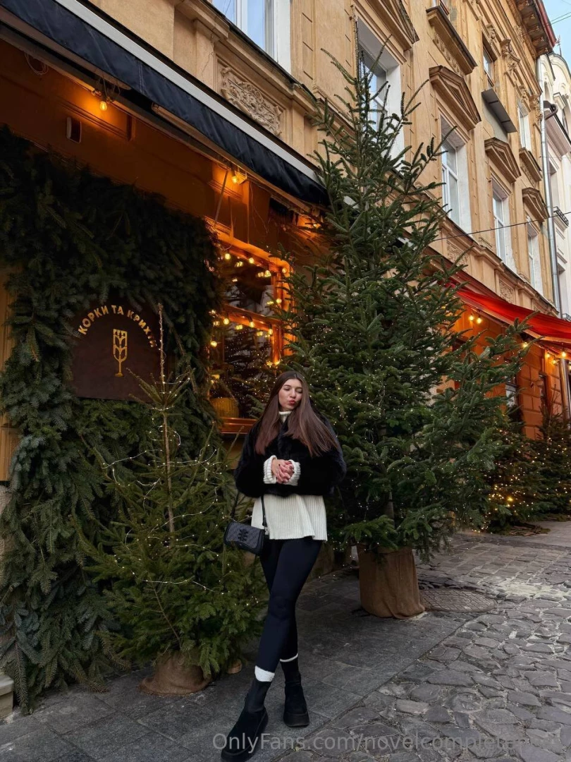 Cozy vibes in the city lights just me a white sweater and a little part 1 