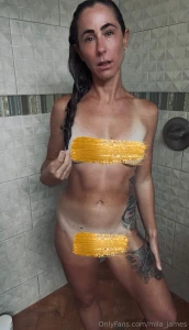 Still in my skimpy bikini from surfing i get naked in the shower for