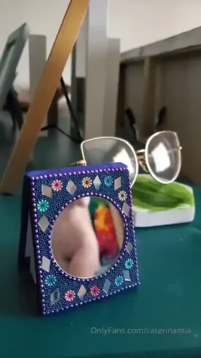 This tiny notebook has a little mirror on it 