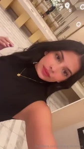 This black shirt and gold necklace are just perfect