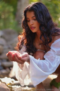 Summer nymph this inquisitive little fae spends her days tending to