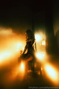 The rose in her hands is like a memory of something unspoken