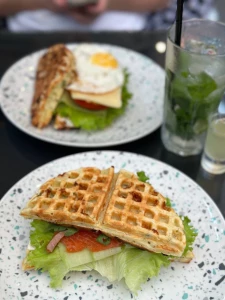 Summer is in full swing enjoying a snack at a cozy cafe after a stroll part 1