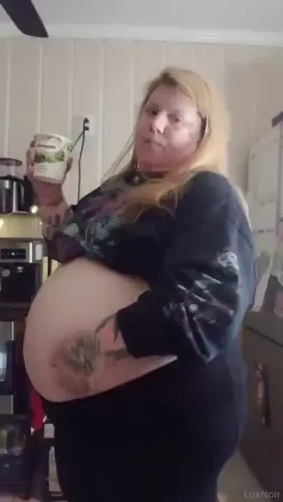 Chugging ice cream into my already over stuffed belly 