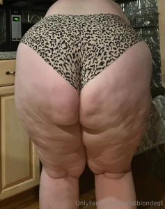 While bending over to shove her grubby hands into the oven for cookies