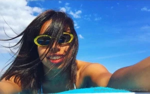 Lying on the beach waiting for you to text me