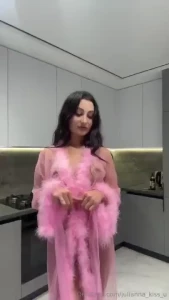 Through the soft waves of pink i feel how this robe hugs me like a