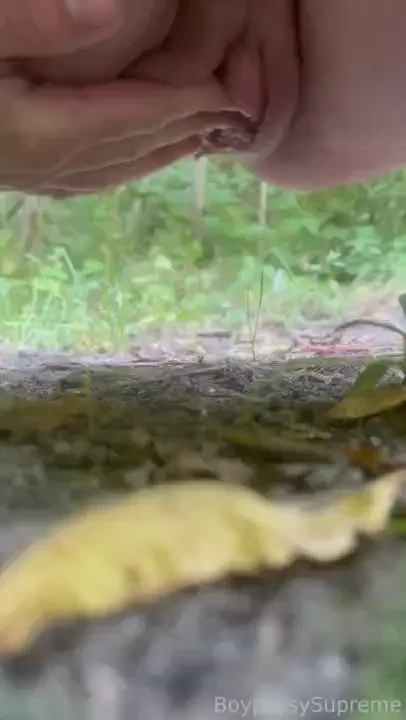 Rubbing my smooth ftm pussy while pissing outside on a risky trail 