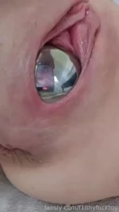 Playing with two huge steel balls one in my pussy and one in my