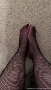 For those that like feet and legs in fishnet stockings a little show