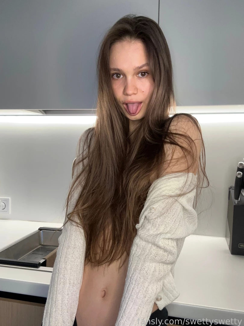 Basking in the glow of confidence and kitchen lights here s a playful 