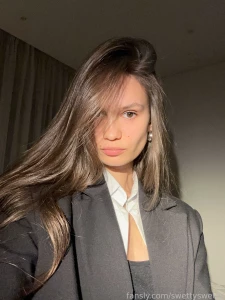 Sassy stare silky hair and a blazer that means business ready to take