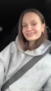 Caught in the act of being perfectly candid just a girl a car and a