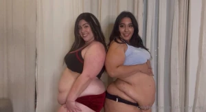 Two hot fatties stretching is definitely better than one