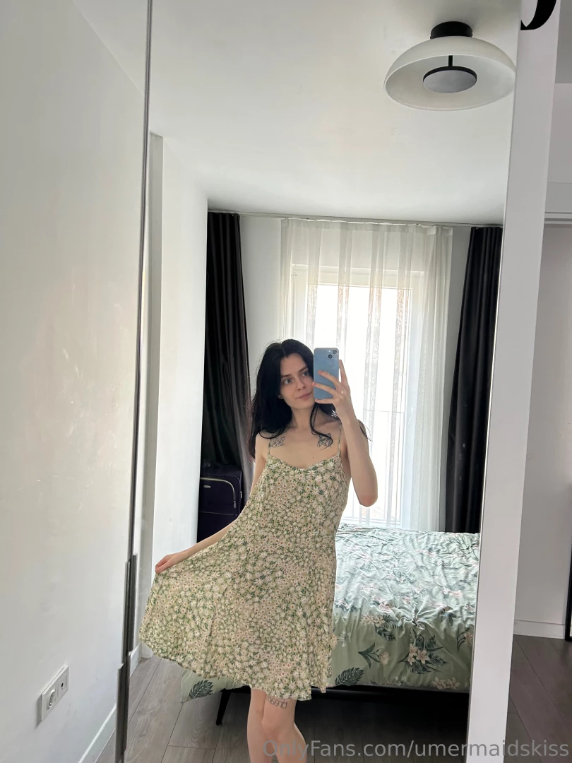 Twirling in my favorite floral dress and feeling oh-so-cute the light 