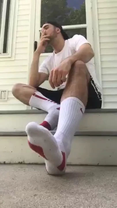 Smoking a cig in my white and red elites 