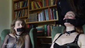 Duct tape in the library these girls just won t stop giggling all i