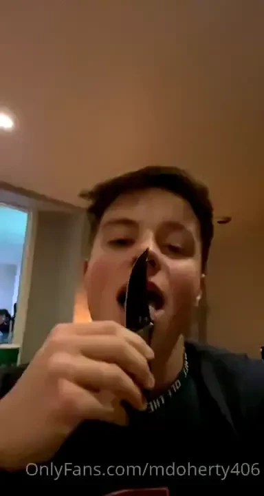 Licking a knife 
