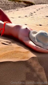 Relaxed on hot sand at least twice a week