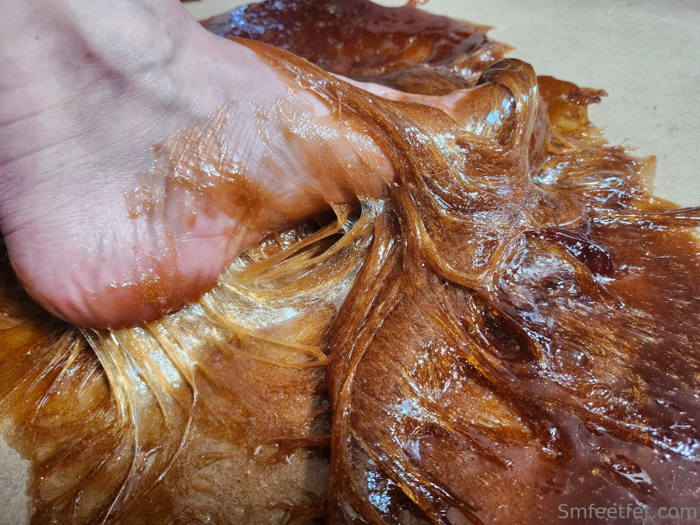 Feet stuck in melted gummy bears 4lbs of melted gummy bears vs my feet 